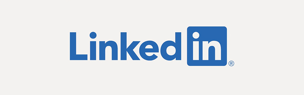 Linkedin écris en bleu sur fond gris