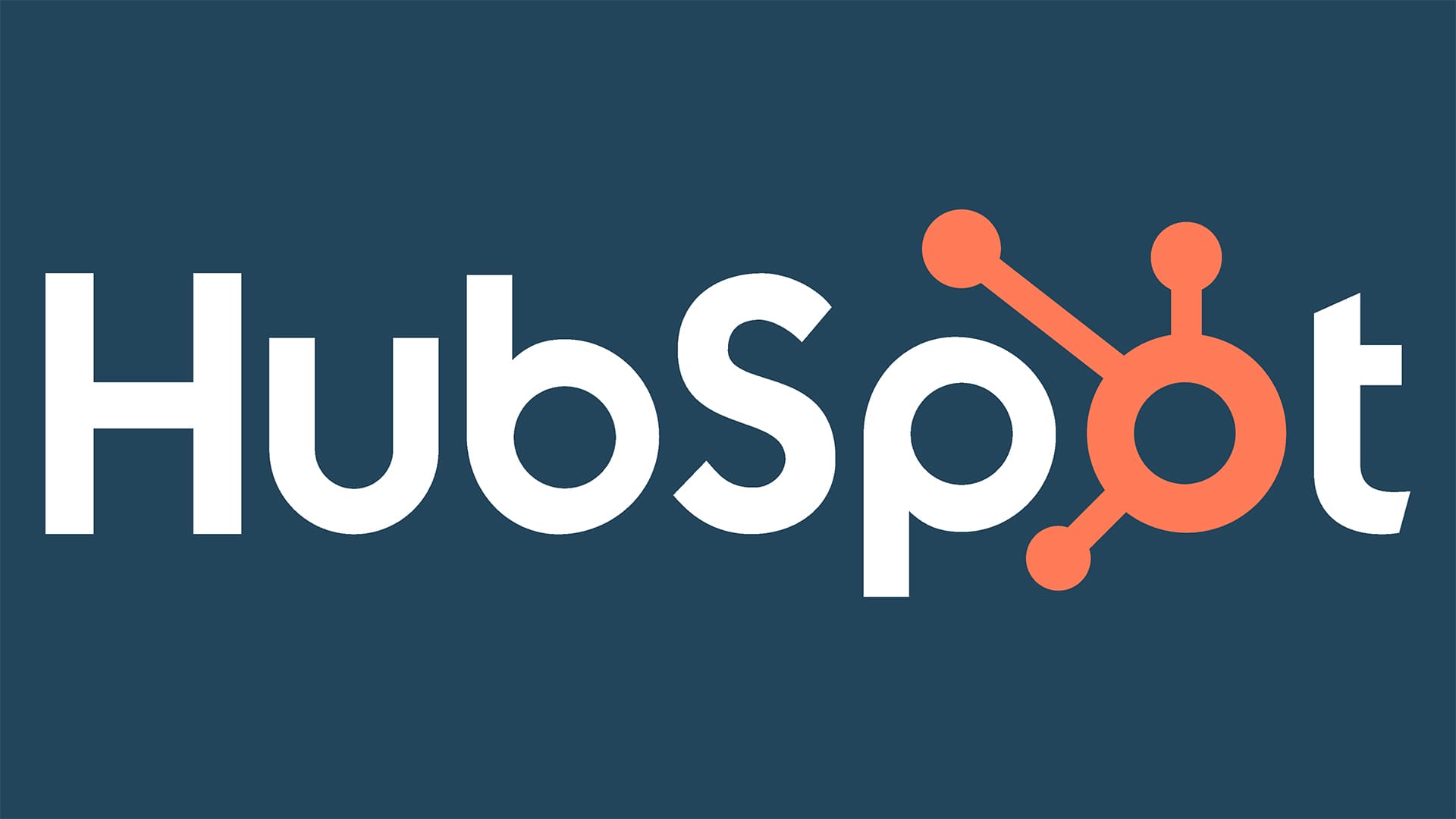 Hubspot written in white with the O in orange on a dark gray background