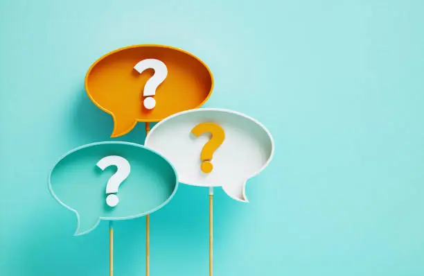 3 points d'interrogation de couleurs differentes