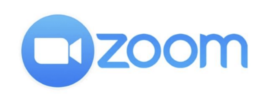 Zoom in on light blue writing on a white background with a camera next to it.